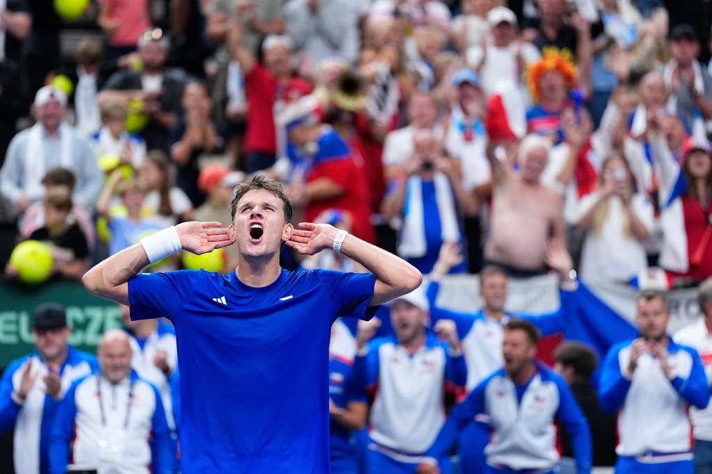 Czechia's Jakub Mensik celebrates after defeating United States' Ben Shelton during the Davis Cup second round qualifier match between the Czech Republic and the United States, in Prague, Saturday, Sept. 19, 2026. (AP Photo/Petr David Josek)