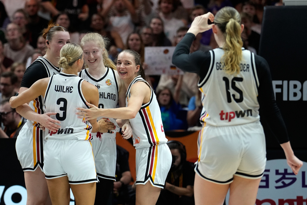 German players react during the Women's Basketball World Cup match between the Germany and Mali in Berlin, Monday, Sept. 7, 2026. (AP Photo/Ebrahim Noroozi)