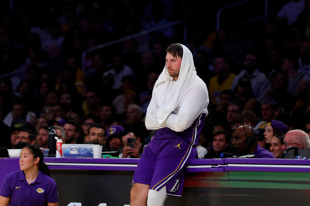 Los Angeles Lakers guard Luka Doncic (77) stands on the sideline during the second half of an NBA basketball game against the Portland Trail Blazers, Tuesday, Oct. 27, 2026, in Los Angeles. (AP Photo/Caroline Brehman)