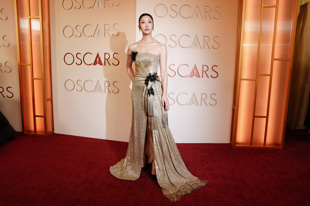 Ejae arrives at the Oscars on Sunday, March 15, 2026, at the Dolby Theatre in Los Angeles. (Photo by Jordan Strauss/Invision/AP)