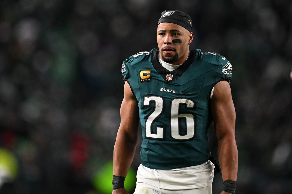 FILE - Philadelphia Eagles running back Saquon Barkley (26) walks off the field during halftime or an NFL wild card playoff football game against the San Francisco 49ers, Sunday, Jan. 11, 2026, in Philadelphia. (AP Photo/Terrance Williams, File)