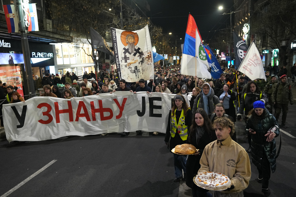 Led by university students, people attend a protest against a government crackdown on universities that have been a main force behind more than a year of protests shaking autocratic President Aleksandar Vucic's rule, in Belgrade, Serbia, Tuesday, Jan. 27, 2026. (AP Photo/Darko Vojinovic)