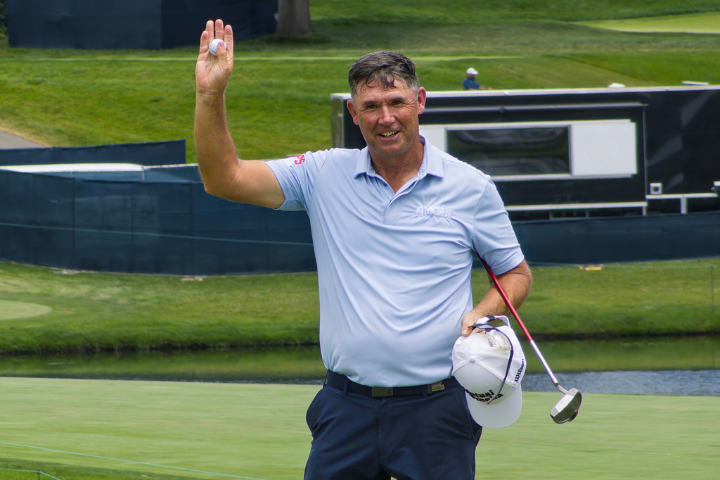 Padraig Harrington salutes the crowd after finishing his round with a 4-under 66 during the final round of the U.S. Senior Open at Scioto Country Club in Columbus, Ohio, on July 5, 2026. (AP Photo/Joe Reedy)