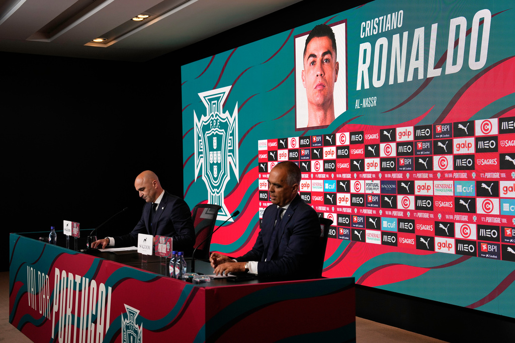 Portugal's head coach Roberto Martinez calls the name of Cristiano Ronaldo when announcing the squad for the 2026 World Cup, in Oeiras, outside Lisbon, Tuesday, May 19, 2026. (AP Photo/Armando Franca)