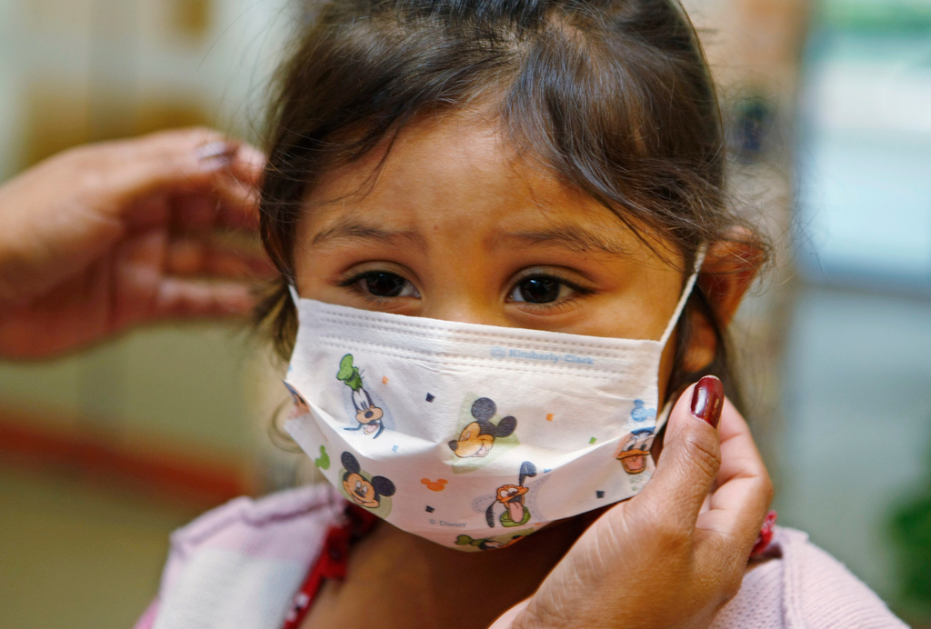 FILE - Lucile Packard Children's Hospital at Stanford visitor Sheila Garcia, 3, wears before visiting a patient at the hospital in Palo Alto, Calif., Oct. 19, 2009. (AP Photo/Paul Sakuma, File)
