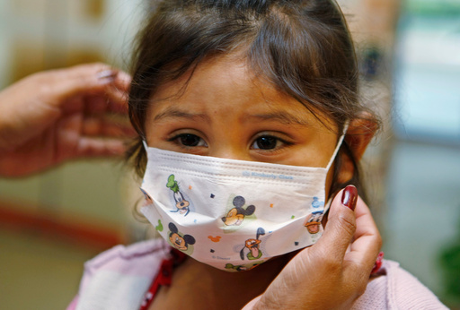 FILE - Lucile Packard Children's Hospital at Stanford visitor Sheila Garcia, 3, wears before visiting a patient at the hospital in Palo Alto, Calif., Oct. 19, 2009. (AP Photo/Paul Sakuma, File) FILE - Lucile Packard Children's Hospital at Stanford visitor Sheila Garcia, 3, wears before visiting a patient at the hospital in Palo Alto, Calif., Oct. 19, 2009. (AP Photo/Paul Sakuma, File)