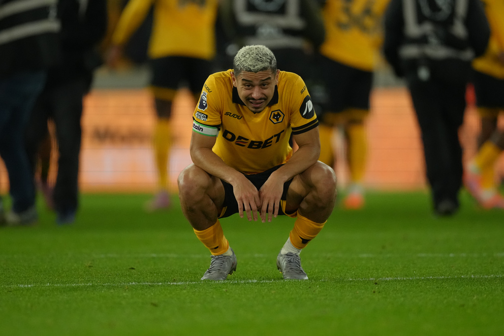 Wolverhampton Wanderers' Andre reacts after the Premier League soccer match between Wolverhampton Wandere and Manchester United in Wolverhampton, England Monday, Dec. 8, 2025. (AP Photo/Dave Shopland)