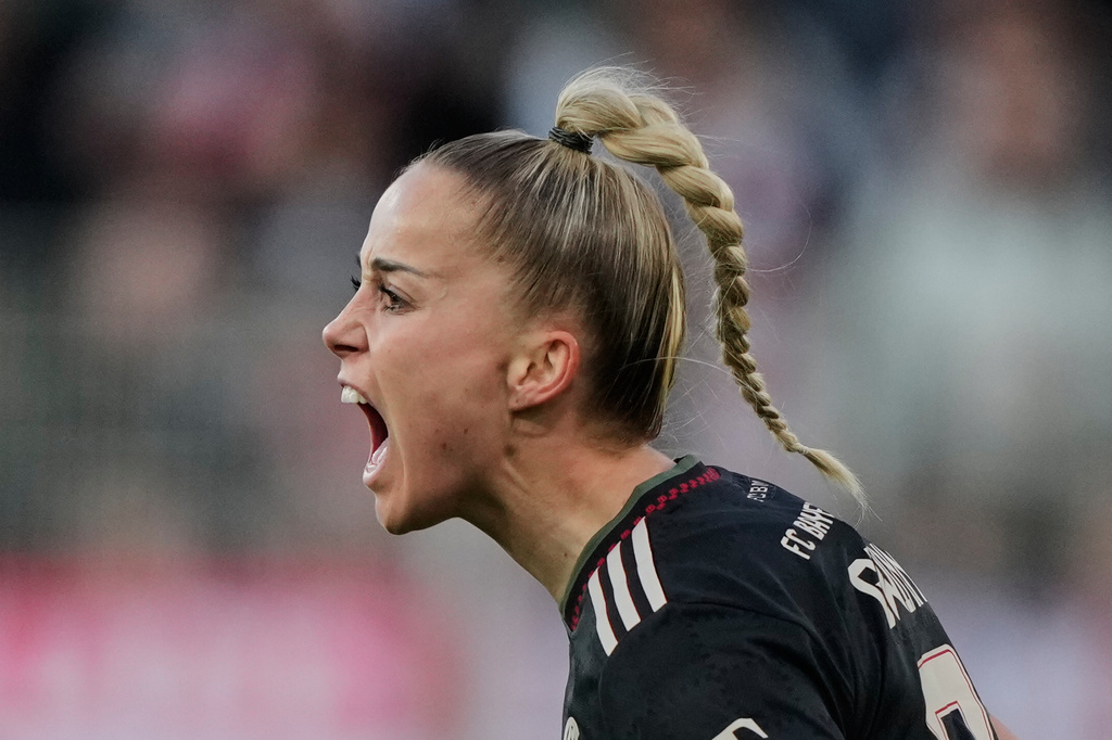 Bayern's Giulia Gwinn celebrates her side's third goal during a German women's Bundesliga soccer match between 1.FC Union Berlin and Bayern Munich in Berlin, Germany, Wednesday, April 22, 2026. (AP Photo/Ebrahim Noroozi)