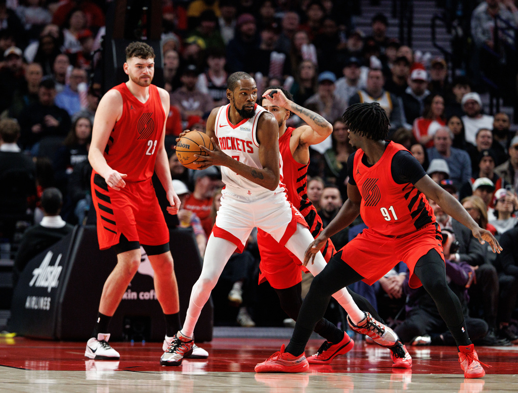Houston Rockets forward Kevin Durant, controls the ball against the Portland Trail Blazers during the first half of an NBA basketball game Friday, Jan. 9, 2026, in Portland, Ore. (AP Photo/Howard Lao)