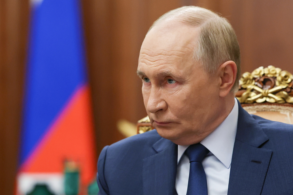Russian President Vladimir Putin attends a meeting with Russian Deputy Prime Minister Dmitri Patrushev at the Kremlin in Moscow, Russia, Monday, Oct. 6, 2025. (Alexander Kazakov, Sputnik, Kremlin Pool Photo via AP)