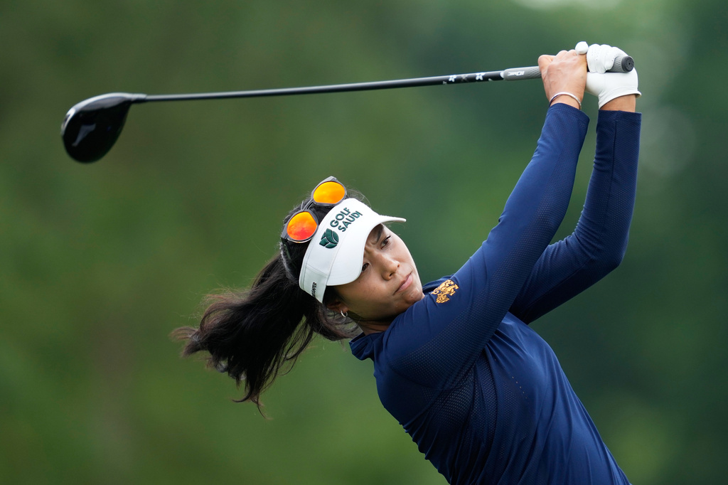 Patty Tavatanakit, of Thailand, watches her tee shot on the fifth hole during the third round of the Chevron Championship LPGA golf tournament Saturday, April 25, 2026, in Houston. (AP Photo/Ashley Landis)