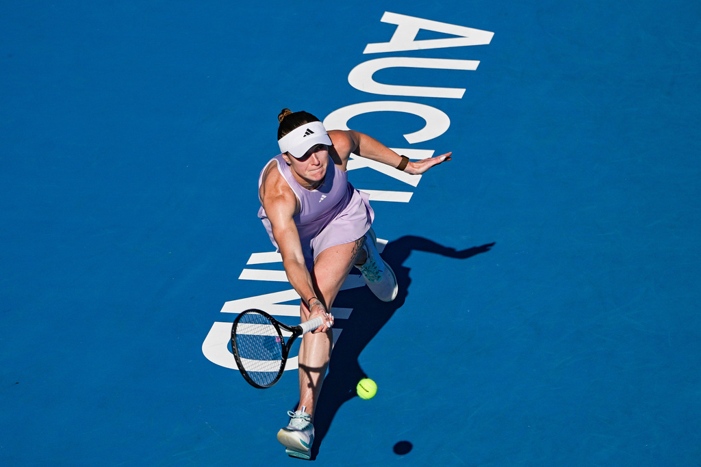 Elina Svitolina of Ukraine plays a forehand return to Wang Xinju of China during the women's single final match of the ASB Classic women's tennis tournament in Auckland, New Zealand on Sunday 11 Jan. 2026. (Alan Lee/Photosport via AP)