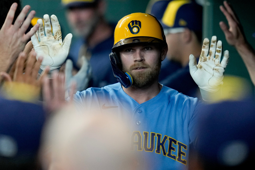 Milwaukee Brewers' Jake Bauers celebrates after his two-run home run against the Houston Astros during the fourth inning of a baseball game, Sunday, May 31, 2026, in Houston. (AP Photo/Eric Christian Smith)
