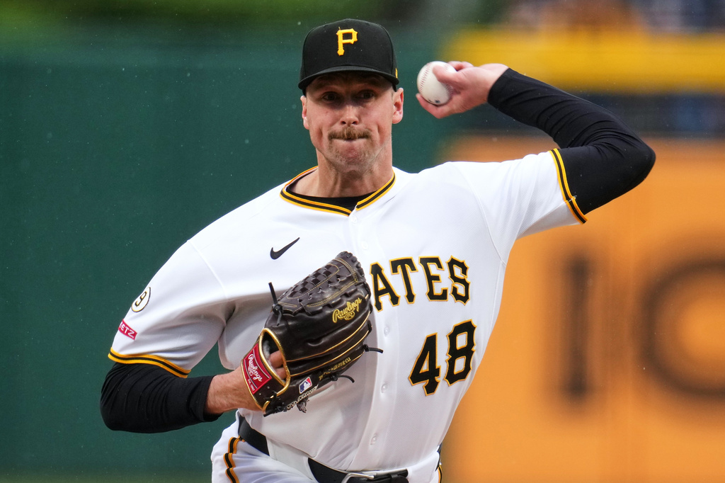 Pittsburgh Pirates pitcher Evan Sisk delivers during the second inning of a baseball game against the Colorado Rockies in Pittsburgh, Thursday, May 14, 2026. (AP Photo/Gene J. Puskar)