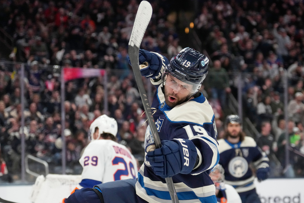 Columbus Blue Jackets center Adam Fantilli (19) celebrates after scoring in the second period of an NHL hockey game against the New York Islanders in Columbus, Ohio, Saturday, Feb. 28, 2026. (AP Photo/Sue Ogrocki)