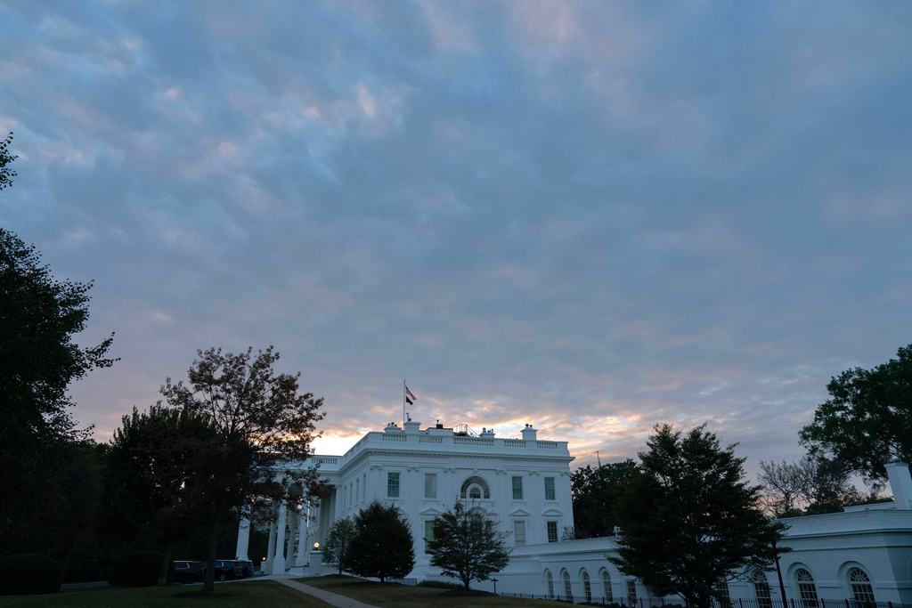 The White House is seen on a sunrise Sunday, Sept. 28, 2025, in Washington. (AP Photo/Jose Luis Magana)