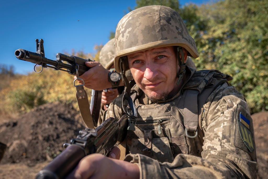 Ukrainian soldiers of the 66th Brigade take part in a training combat exercise in Donetsk region, Ukraine, Thursday, Sept. 25, 2025. (AP Photo/Dan Bashakov)