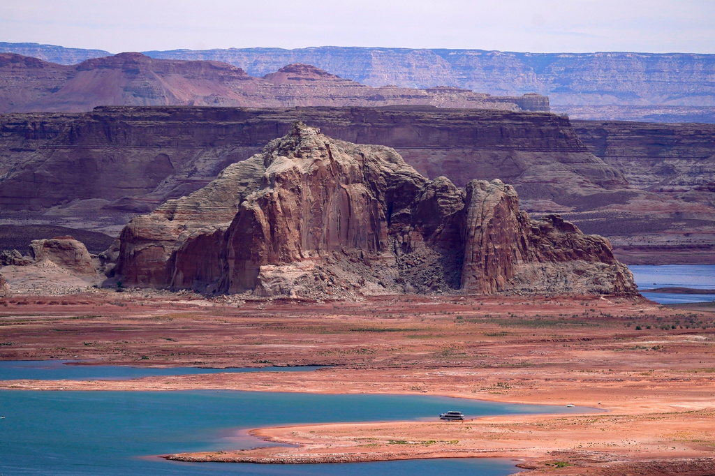 FILE - Low water levels at Wahweap Bay at Lake Powell, along the Upper Colorado River Basin are shown, June 9, 2021, at the Utah and Arizona border at Wahweap, Ariz. (AP Photo/Ross D. Franklin, File)