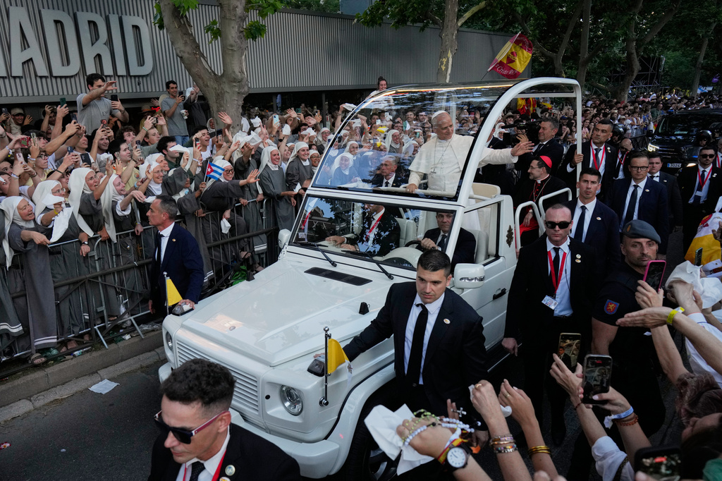 Pope Leo XIV arrives in the popemobile at Plaza de Lima in Madrid, Saturday, June 6, 2026, for a prayer vigil with young people on the first day of a seven-day apostolic journey to mainland Spain and the Canary Islands. (AP Photo/Bernat Armangue)