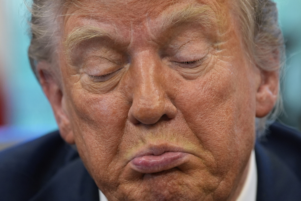 President Donald Trump speaks with reporters after signing executive orders in the Oval Office of the White House, Wednesday, April 23, 2025, in Washington. (AP Photo/Alex Brandon)
