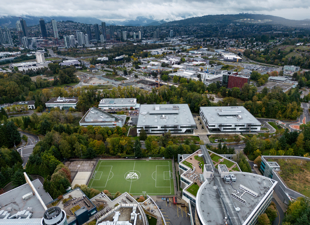The EA Sports logo is seen on a soccer pitch at the Electronic Arts' office and studio complex, in Burnaby, British Columbia, Monday, Sept. 29, 2025, as the maker of video games like “Madden NFL," “Battlefield,” and “The Sims,” is being acquired for $55 billion in what could become the largest private equity-funded buyout in history. (Darryl Dyck/The Canadian Press via AP)