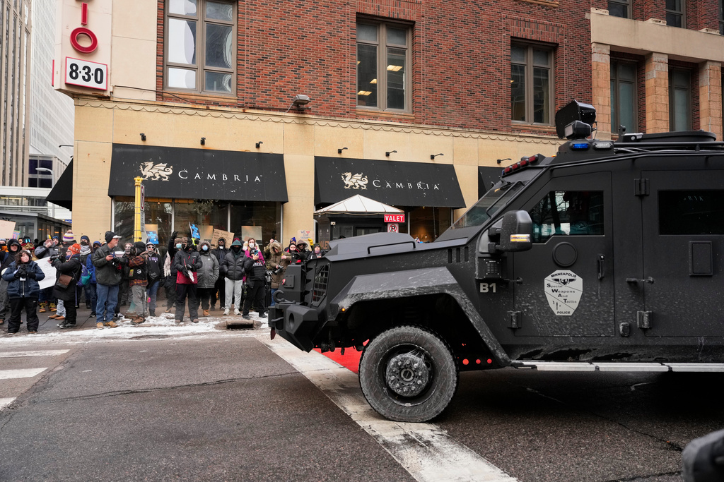 Minneapolis Police officers respond to immigration protests Saturday, Jan. 17, 2026, in Minneapolis. (AP Photo/Yuki Iwamura)