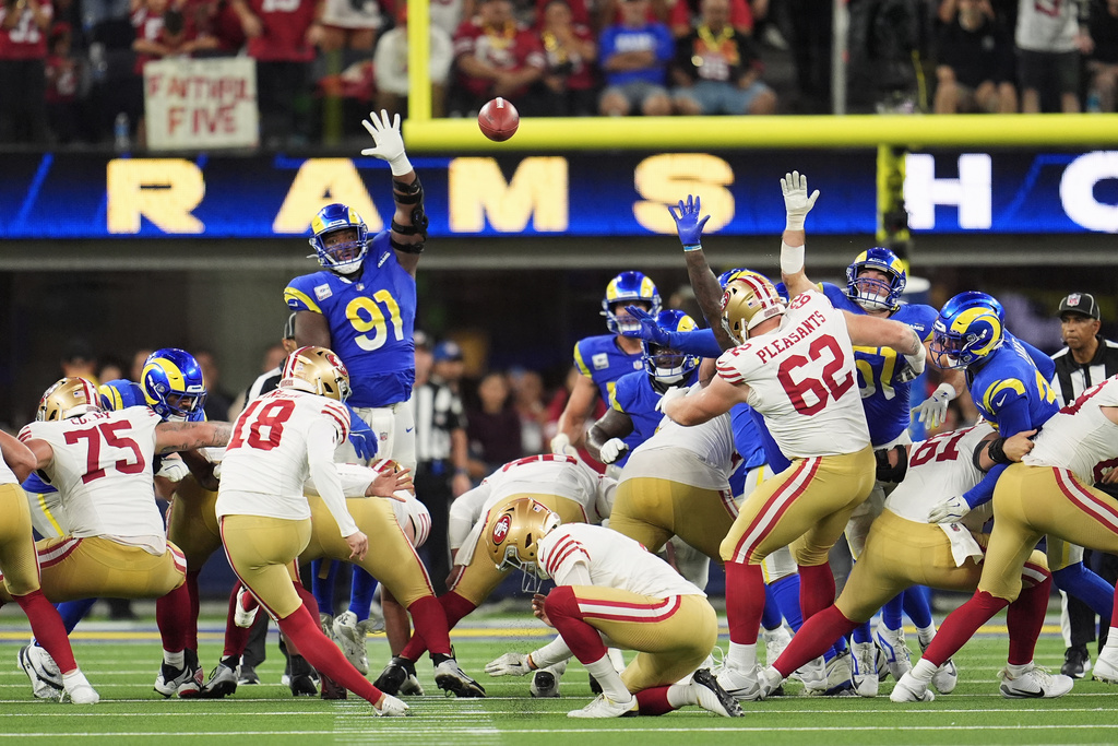 San Francisco 49ers kicker Eddy Piñeiro (18) kicks a field goal during overtime of an NFL football game against the Los Angeles Rams, Thursday, Oct. 2, 2025, in Inglewood, Calif. (AP Photo/Marcio Jose Sanchez)
