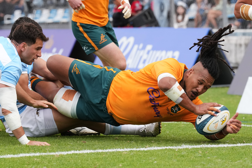 Australia Brandon Paenga-Amosa scores a try against Argentina during a rugby test match in Jujuy, Argentina, Saturday, Aug. 29, 2026. (AP Photo/Gustavo Garello)