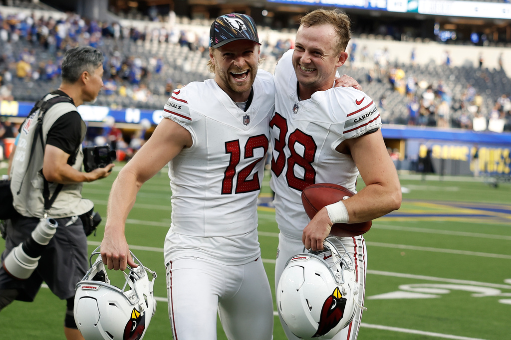 Arizona Cardinals kicker Chad Ryland, right, celebrates with Blake Gillikin (12) after an NFL football game against the Los Angeles Rams in Inglewood, Calif., Sunday, Oct. 18, 2026. (AP Photo/Caroline Brehman)