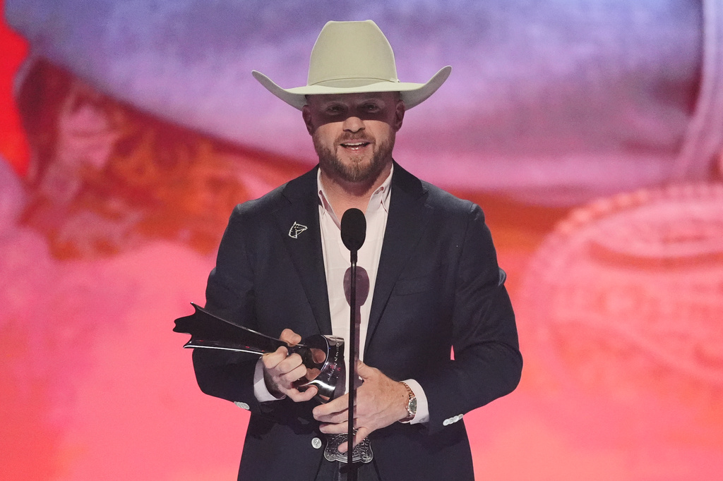 Cody Johnson accepts the award for male artist of the year during the 61st annual Academy of Country Music Awards on Sunday, May 17, 2026, at the MGM Grand Garden Arena in Las Vegas. (AP Photo/Chris Pizzello)