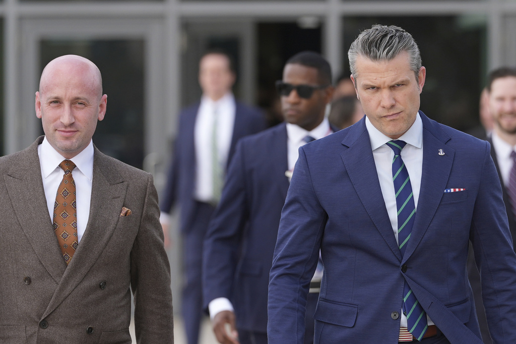 White House deputy chief of staff Stephen Miller, left, and Defense Secretary Pete Hegseth arrive at the inaugural Americas Counter Cartel Conference at U.S. Southern Command in Doral, Fla., Thursday, March 5, 2026. (AP Photo/Rebecca Blackwell)