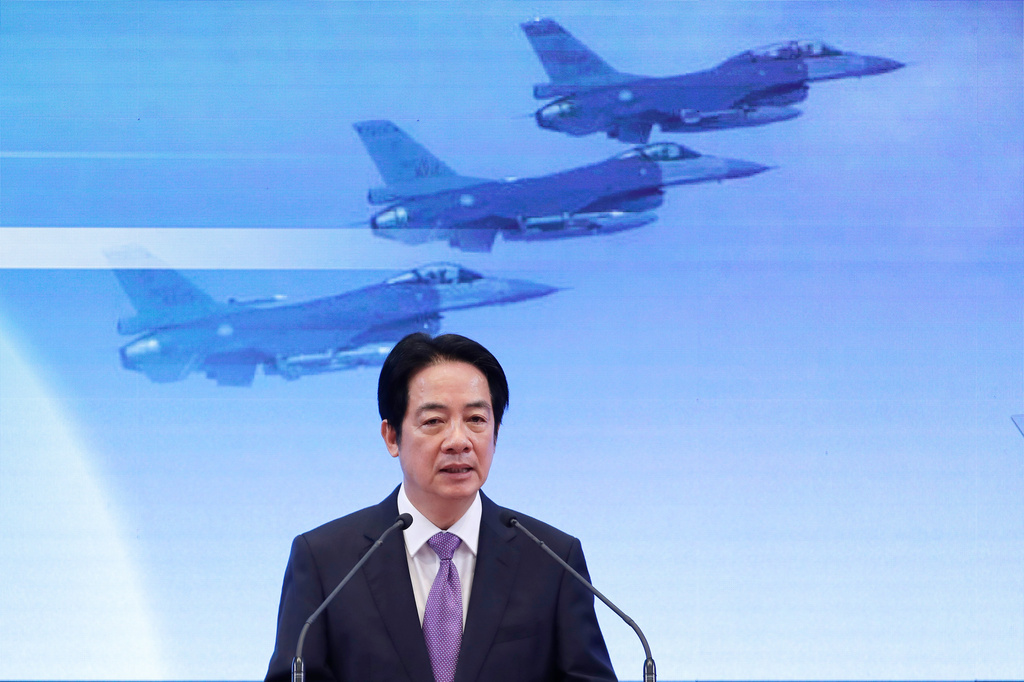 Taiwanese President Lai Ching-te delivers a speech to mark his second anniversary in office during a press conference in Taipei, Taiwan, Wednesday, May 20, 2026. (AP Photo/Chiang Ying-ying)