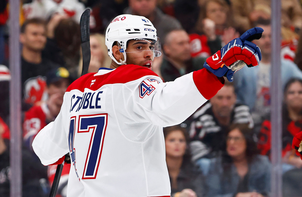 Montréal Canadiens defenseman Jayden Struble reacts after scoring against the New Jersey Devils during the first period of an NHL hockey game, Saturday, April 4, 2026, in Newark, N.J. (AP Photo/Noah K. Murray)
