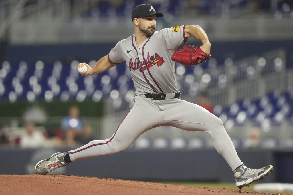 Atlanta Braves starting pitcher Spencer Strider aims a pitch during the first inning of a baseball game against the Miami Marlins, Monday, Aug. 25, 2025, in Miami. (AP Photo/Marta Lavandier)