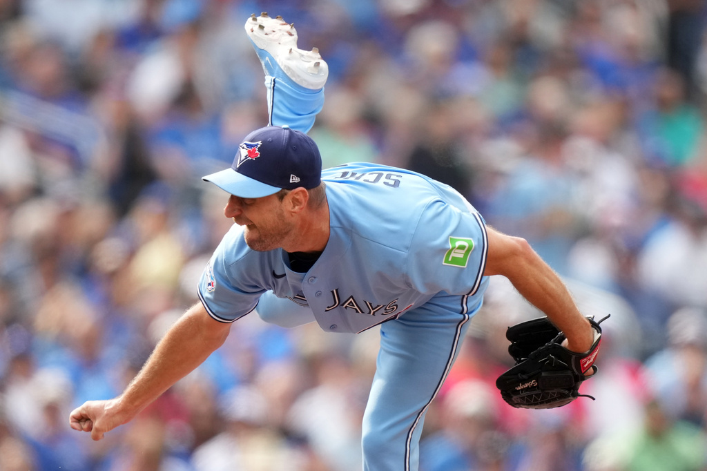 Toronto Blue Jays pitcher Max Scherzer (31) throws during the first inning of a baseball game against the Detroit Tigers in Toronto, Wednesday, Sept. 16, 2026. (Nathan Denette/The Canadian Press via AP)