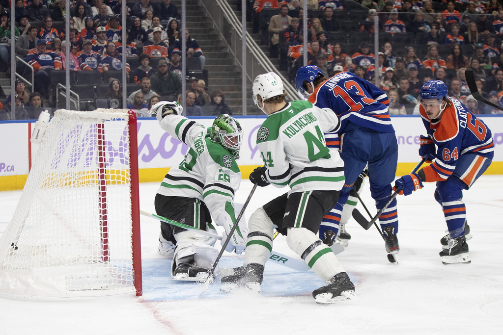 Dallas Stars' goalie Jake Oettinger (29) is scored on by Edmonton Oilers' Connor Clattenburg (64) during the second period of an NHL hockey game in Edmonton, Alberta, Tuesday, Nov. 25, 2025. (Jason Franson/The Canadian Press via AP)