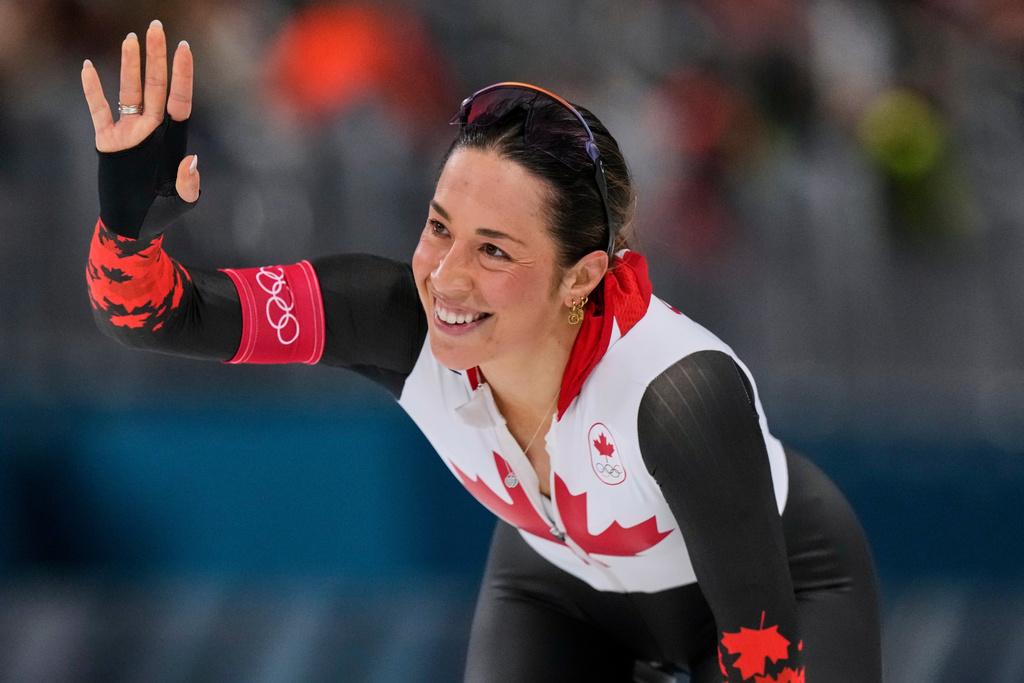 Valerie Maltais of Canada greets fans after competing in the women's 1500 meters speedskating race at the 2026 Winter Olympics, in Milan, Italy, Friday, Feb. 20, 2026. (AP Photo/Luca Bruno)