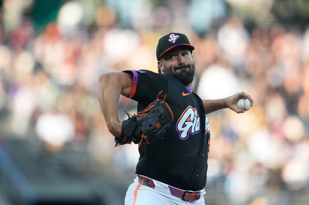 San Francisco Giants pitcher Robbie Ray throws against the Athletics during the first inning of a baseball game Tuesday, June 23, 2026, in San Francisco. (AP Photo/Jeff Chiu)