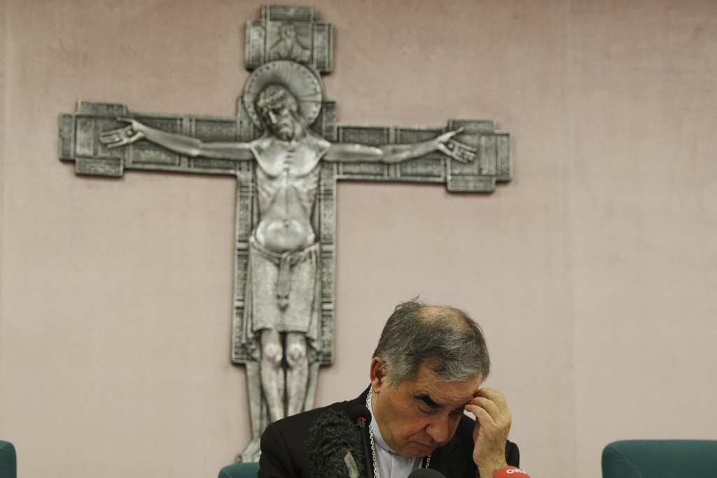 FILE — Cardinal Angelo Becciu talks to journalists during news conference in Rome, Sept. 25, 2020. (AP Photo/Gregorio Borgia, File)