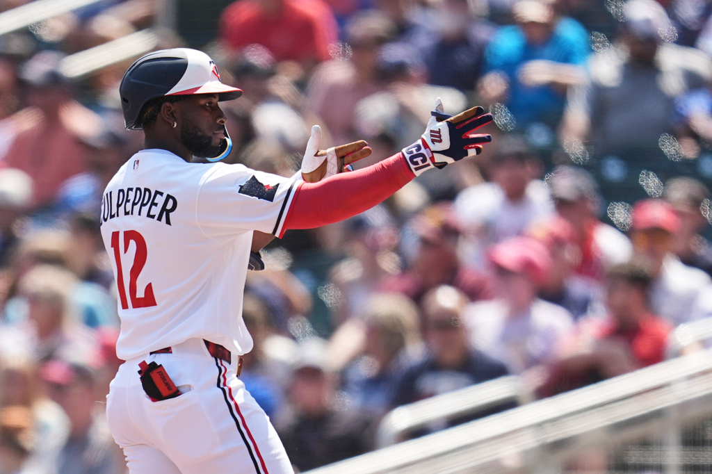 Minnesota Twins' Kaelen Culpepper (12) celebrates after hitting a single during the first inning of a baseball game against the Atlanta Braves, Wednesday, Aug. 19, 2026, in Minneapolis. (AP Photo/Abbie Parr)