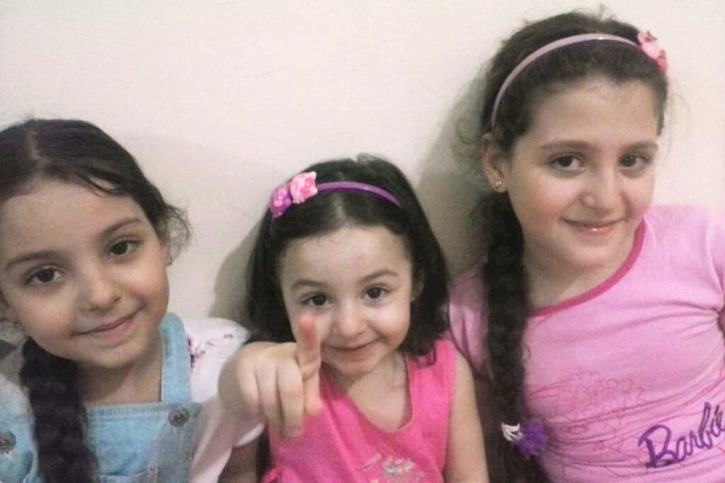 This undated childhood photo provided by Basem Wahbeh shows his three daughters. (Basem Wahbeh via AP)