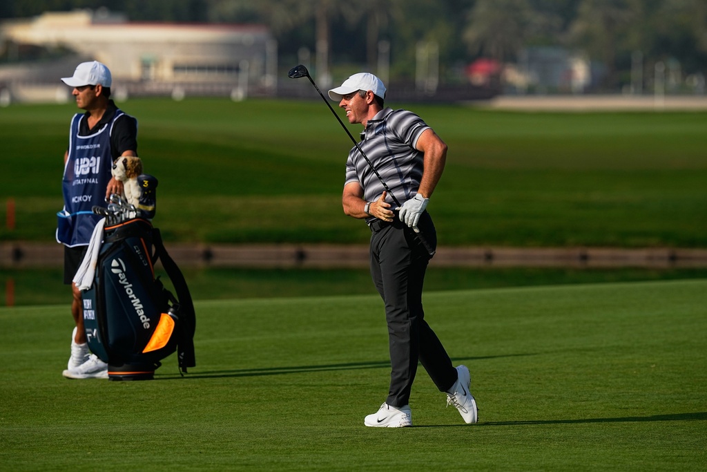 Rory McIlroy of Northern Ireland plays his second shot during the first round of Dubai Invitational golf tournament in Dubai, United Arab Emirates, Thursday, Jan. 15, 2026. (AP Photo/Fatima Shbair)