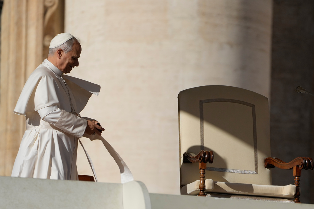 Pope Leo XIV arrives in St. Peter's Square on the occasion of the weekly general audience at the Vatican, Wednesday, Nov. 19, 2025. (AP Photo/Gregorio Borgia)
