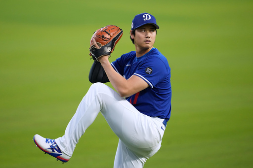 Los Angeles Dodgers' Shohei Ohtani works out ahead of Game 3 of the 2025 World Series against the Toronto Blue Jays in Los Angeles, Sunday, Oct. 26, 2025. (AP Photo/Ashley Landis) Los Angeles Dodgers' Shohei Ohtani works out ahead of Game 3 of the 2025 World Series against the Toronto Blue Jays in Los Angeles, Sunday, Oct. 26, 2025. (AP Photo/Ashley Landis)