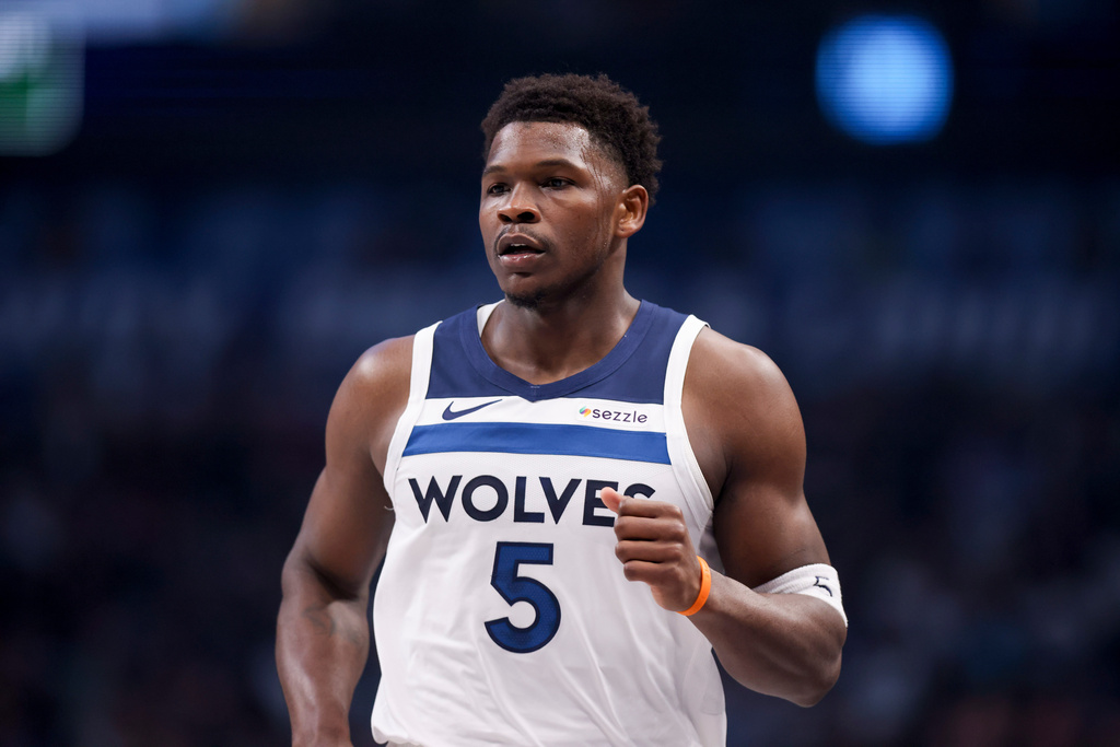 Minnesota Timberwolves guard Anthony Edwards runs the court before an NBA basketball game against the Dallas Mavericks, Monday, March 30, 2026, in Dallas. (AP Photo/Gareth Patterson)