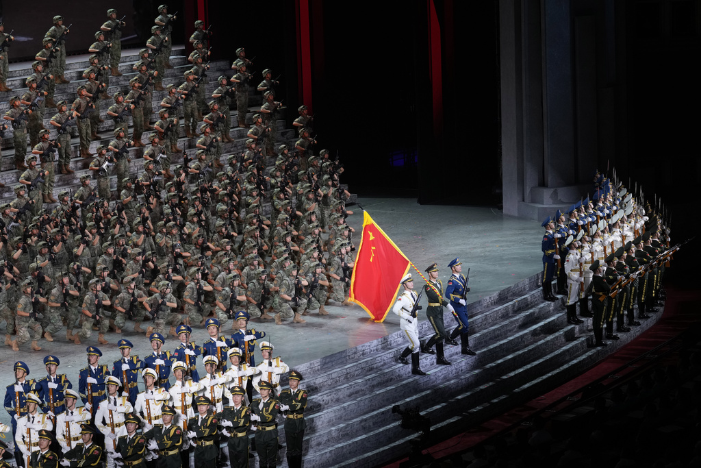 Performers take part in a gala performance entitled "Justice Will Prevail" to commemorate the 80th anniversary of Japan's World War II surrender held at the Great Hall of the People in Beijing, Wednesday, Sept. 3, 2025. (AP Photo/Mahesh Kumar)