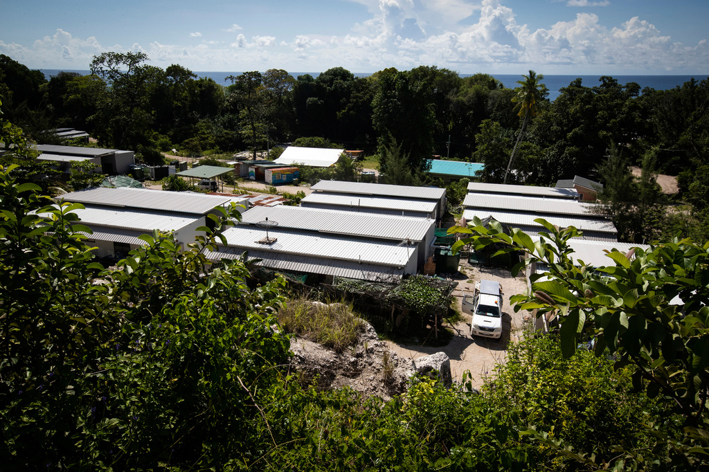 FILE - The Nibok refugee settlement on Nauru is shown from the air, Sept. 4, 2018. (Jason Oxenham/Pool Photo via AP, File)