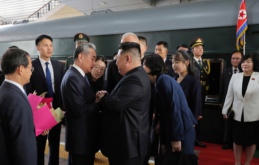 This photo provided by the North Korean government, North Korean leader Kim Jong Un, center, is greeted by Chinese Foreign Minister Wang Yi on his arrival at a station in Beijing, China, Tuesday, Sept. 2, 2025. Independent journalists were not given access to cover the event depicted in this image distributed by the North Korean government. The content of this image is as provided and cannot be independently verified. (Korean Central News Agency/Korea News Service via AP)