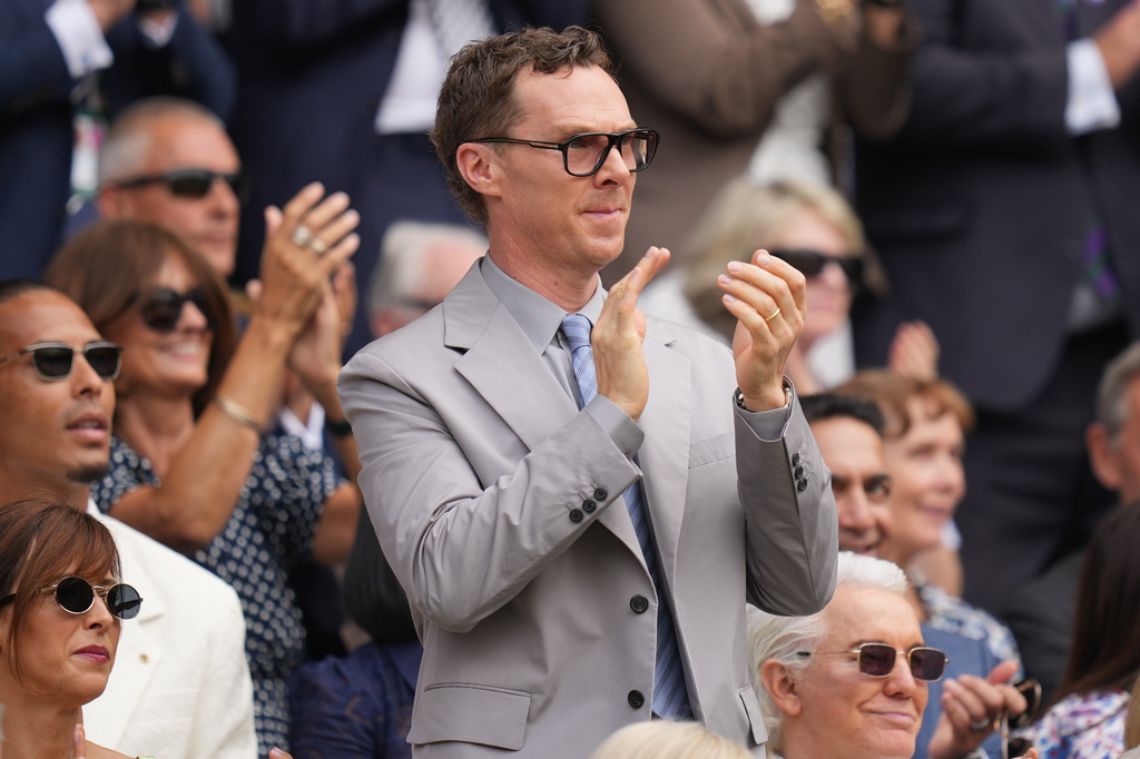 Actor Benedict Cumberbatch applauds as he watches the men's singles semifinal matches from the Royal Box on Center Court at the Wimbledon Tennis Championships in London, Friday, July 10, 2026. (AP Photo/Kirsty Wigglesworth)