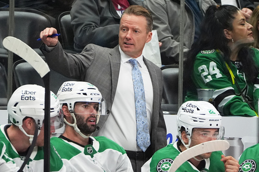 Dallas Stars head coach Glen Gulutzan directs his players in the second period of an NHL hockey game against the Colorado Avalanche, Saturday, Oct. 11, 2025, in Denver. (AP Photo/David Zalubowski) Dallas Stars head coach Glen Gulutzan directs his players in the second period of an NHL hockey game against the Colorado Avalanche, Saturday, Oct. 11, 2025, in Denver. (AP Photo/David Zalubowski)